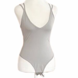 New with tag Capella lightweight gray strappy bodysuit size Large.